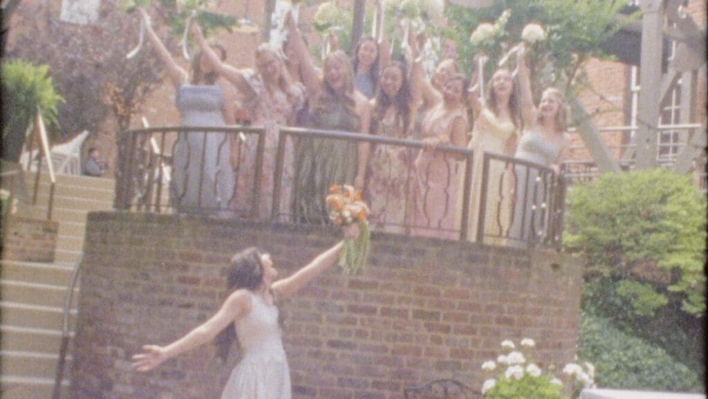 Bride posing playfully at Historic venue