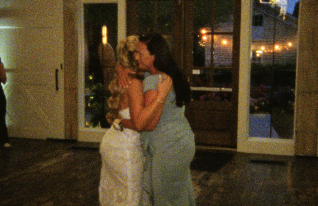 A Super 8mm still frame of the bride dancing with her mother